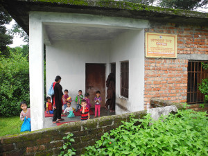 This is the anganwari. Most of families here are very poor, their main income from working in the slate mines. It seems to be quite well attended.