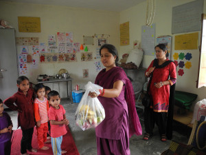 Inside is made bright with drawings on the walls. The anganwaris get enough fruit for the children for 3 days at a time.